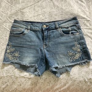 Altar’d State jean shorts with embroidered flowers